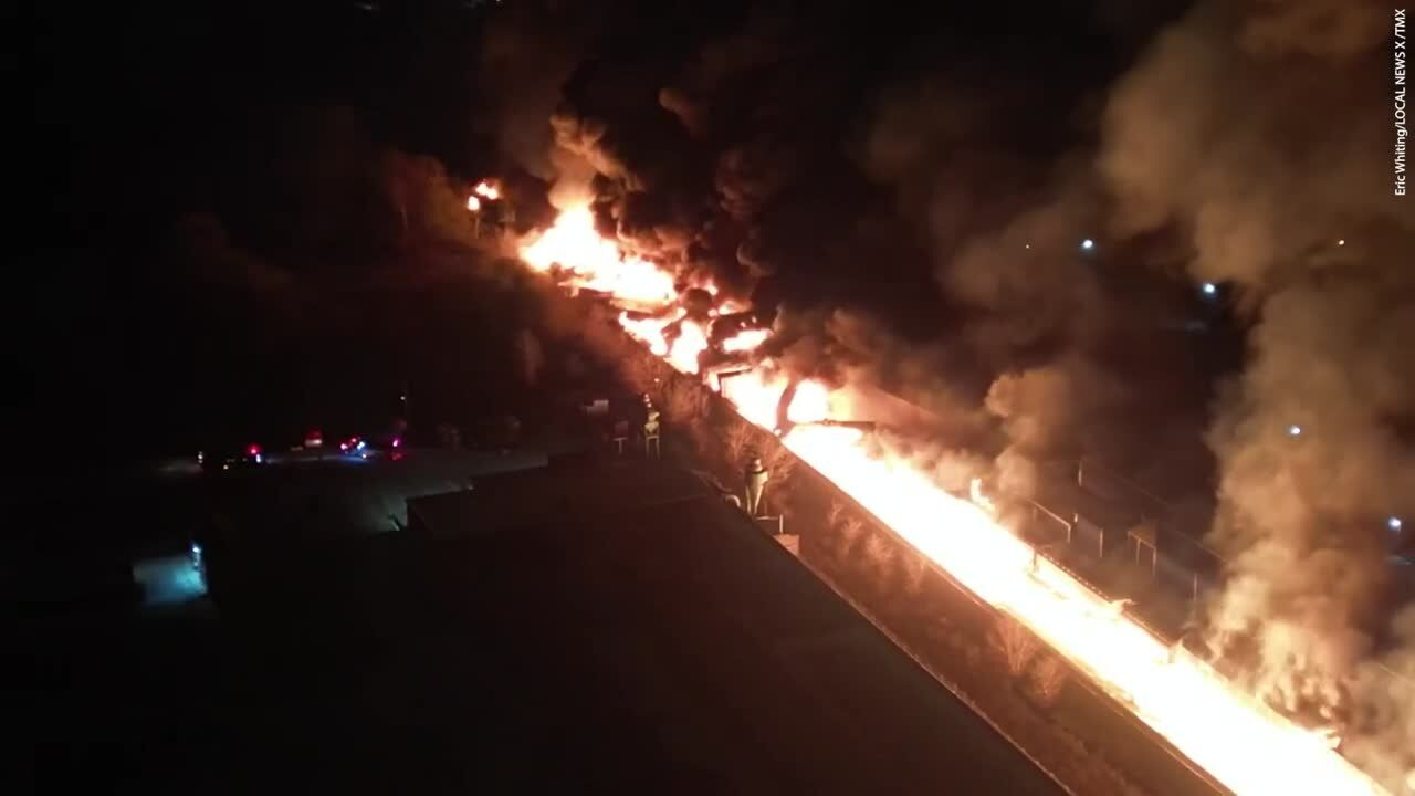 Drone footage captures scale of Ohio train derailment as fears of explosion grow